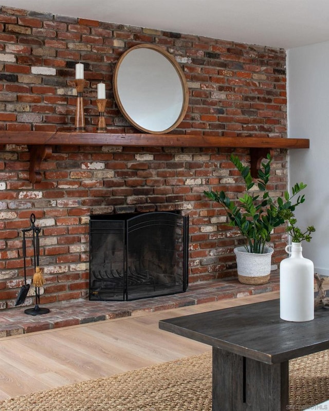 details with a fireplace and hardwood / wood-style floors