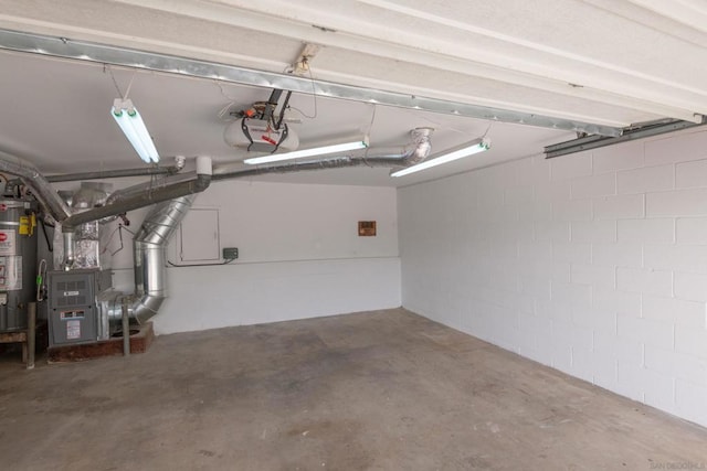 garage featuring gas water heater