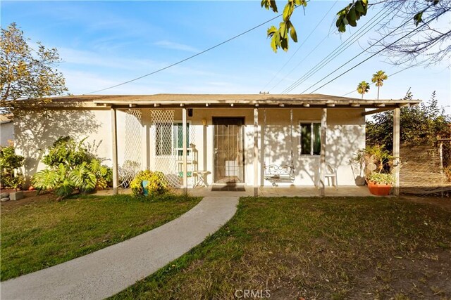 exterior space with a front lawn