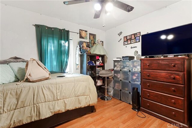 bedroom featuring ceiling fan and light wood-type flooring