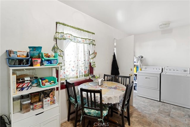 dining space with washing machine and clothes dryer