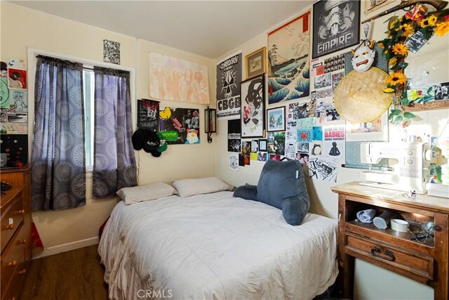 bedroom featuring hardwood / wood-style flooring