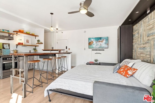 bedroom featuring light wood-type flooring