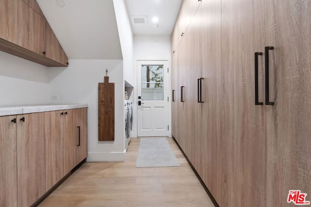 hallway featuring light hardwood / wood-style flooring