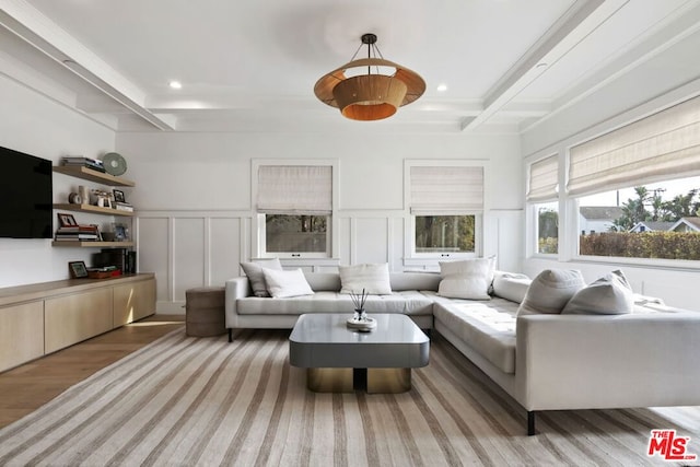 living room featuring coffered ceiling, beam ceiling, and light hardwood / wood-style floors