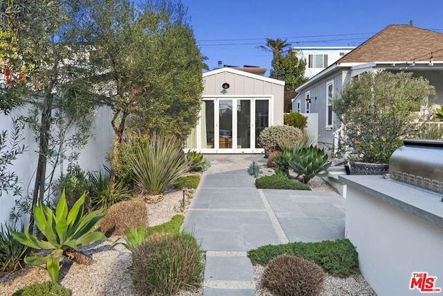 entrance to property with a patio area