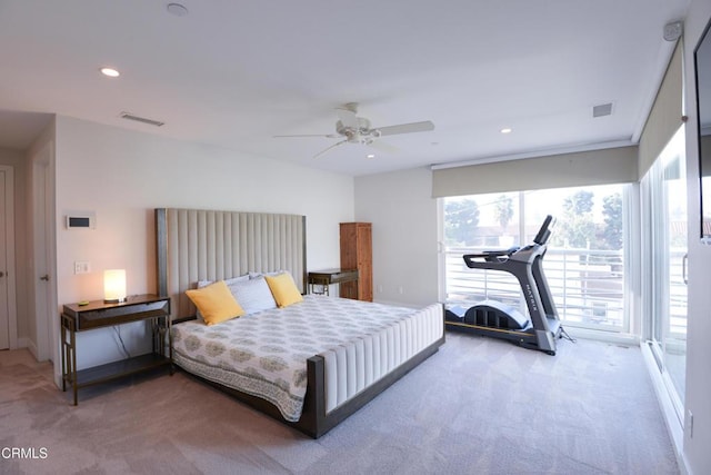 bedroom with multiple windows, carpet floors, and ceiling fan