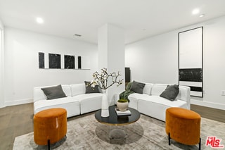 living room with wood-type flooring