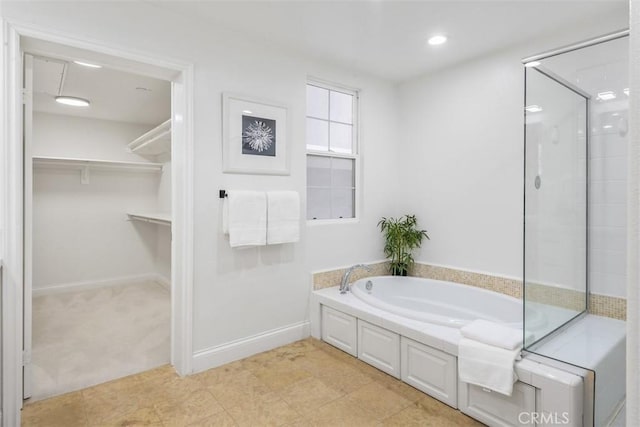 bathroom featuring plus walk in shower