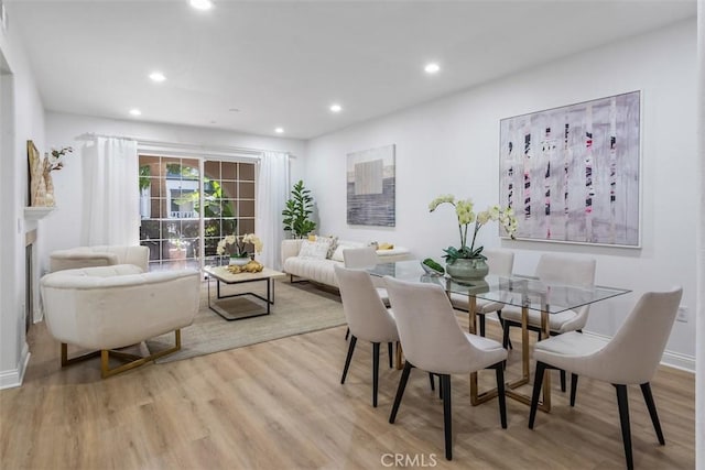 dining room featuring light hardwood / wood-style floors