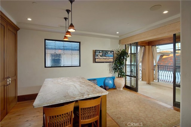 dining area with light hardwood / wood-style flooring