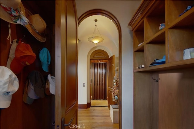 corridor featuring light wood-type flooring