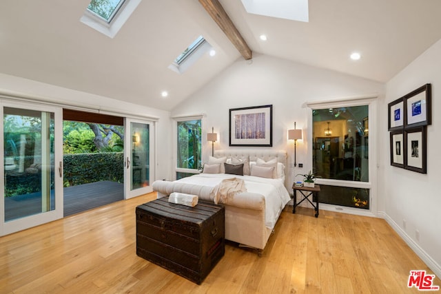 bedroom with a skylight, high vaulted ceiling, beamed ceiling, access to exterior, and light hardwood / wood-style floors