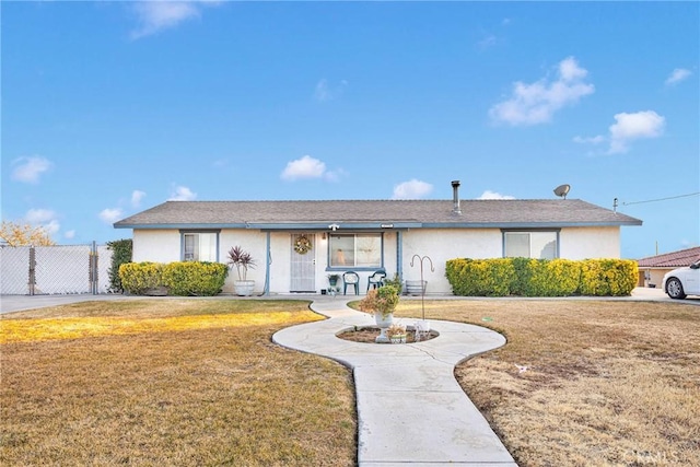 ranch-style house with a front yard