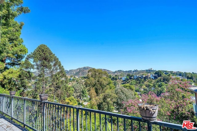 balcony featuring a mountain view