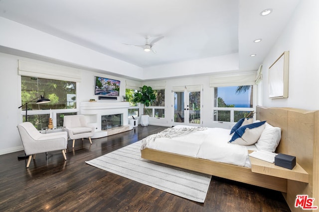 bedroom with hardwood / wood-style flooring and ceiling fan