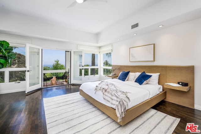 bedroom featuring dark hardwood / wood-style flooring, access to exterior, french doors, and ceiling fan