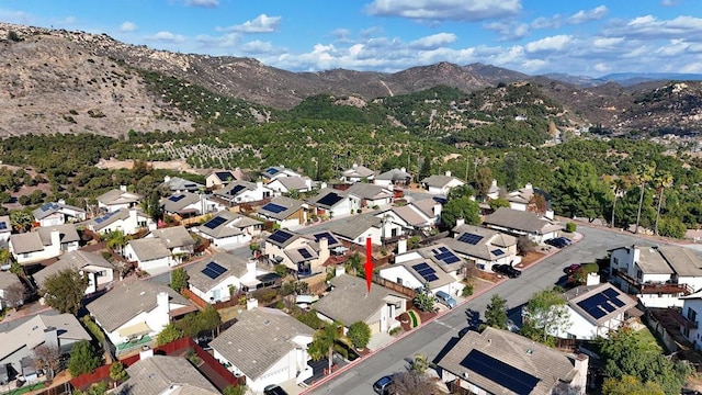 drone / aerial view featuring a mountain view