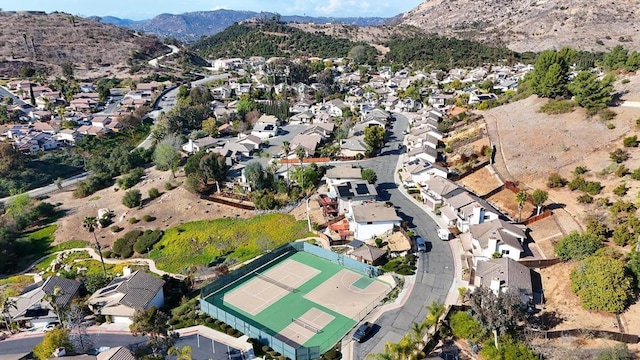 birds eye view of property featuring a mountain view