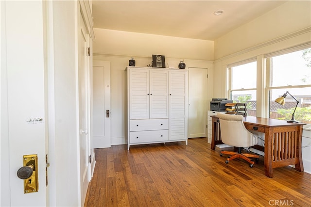 home office featuring hardwood / wood-style flooring