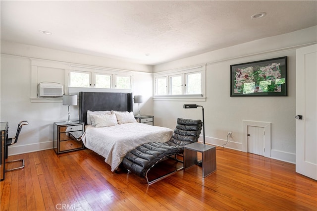 bedroom featuring hardwood / wood-style floors