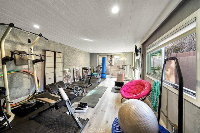 exercise room featuring light hardwood / wood-style flooring