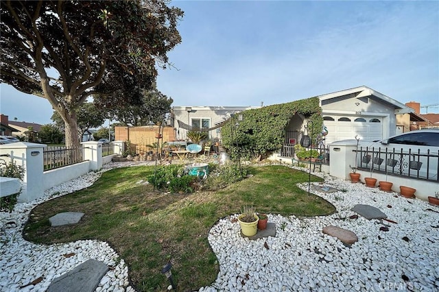 view of yard with a garage