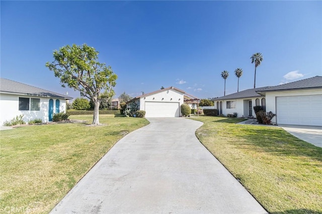 ranch-style home with a garage and a front lawn