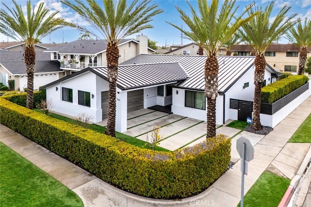 view of front of property with a balcony