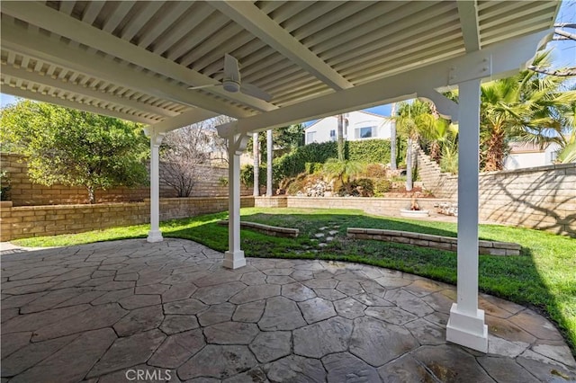 view of patio with ceiling fan