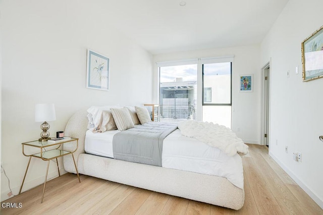 bedroom featuring wood-type flooring