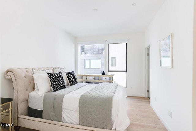 bedroom featuring light hardwood / wood-style floors