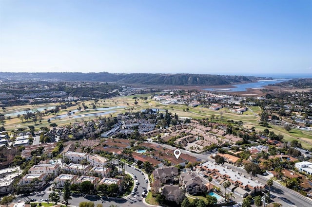 bird's eye view featuring a residential view and a water view