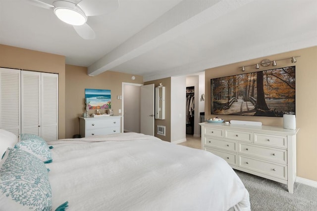 bedroom with baseboards, visible vents, a ceiling fan, light colored carpet, and beamed ceiling