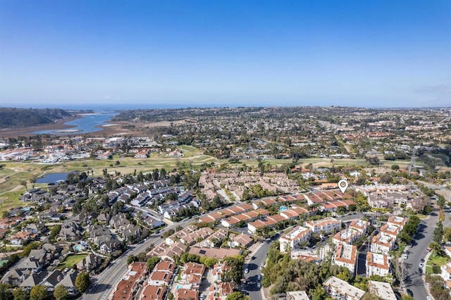 bird's eye view featuring a residential view and a water view