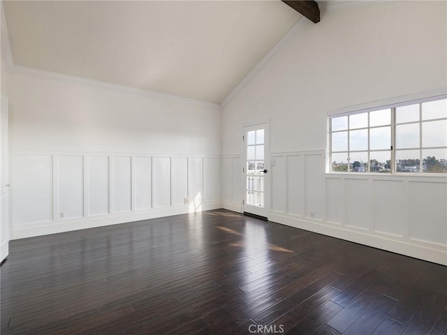 spare room with crown molding, dark hardwood / wood-style floors, and vaulted ceiling with beams