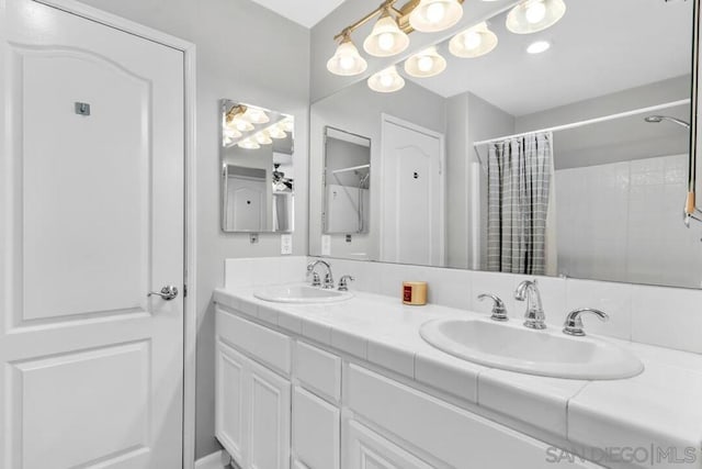 bathroom featuring vanity and walk in shower