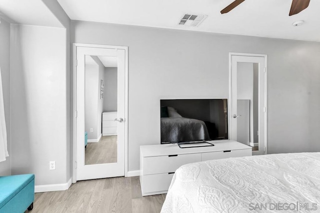 bedroom featuring light hardwood / wood-style flooring and ceiling fan