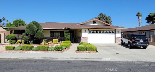 ranch-style house featuring a garage