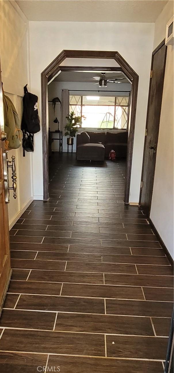 hall featuring dark hardwood / wood-style floors