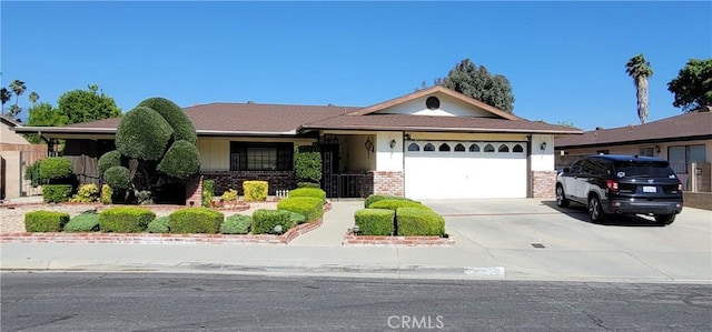 ranch-style home featuring a garage