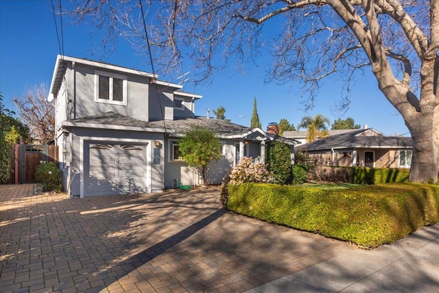 view of front of property featuring a garage