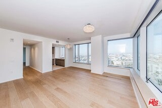 empty room with light wood-type flooring