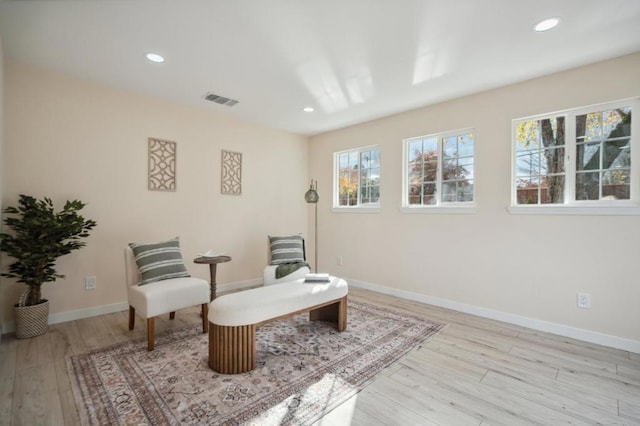 sitting room featuring light wood-type flooring