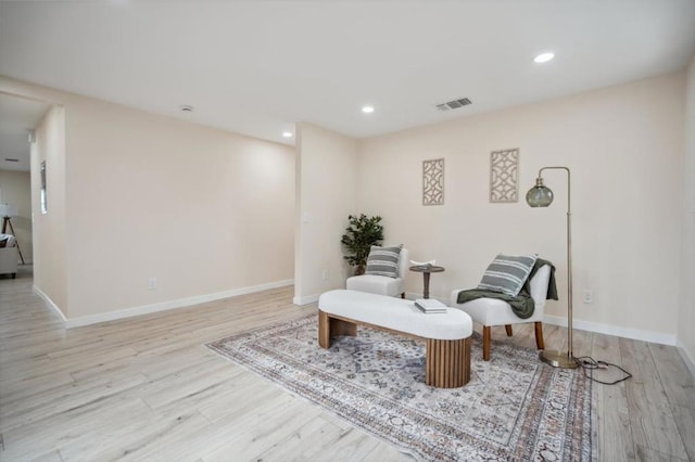 sitting room featuring light wood-type flooring