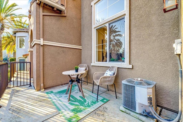 balcony featuring central air condition unit