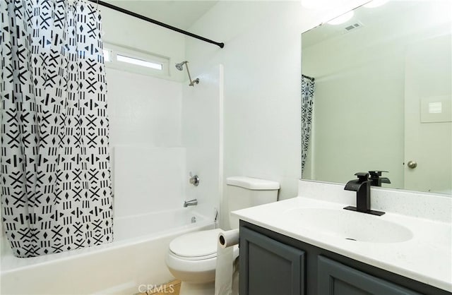 full bathroom featuring shower / bathtub combination with curtain, vanity, and toilet