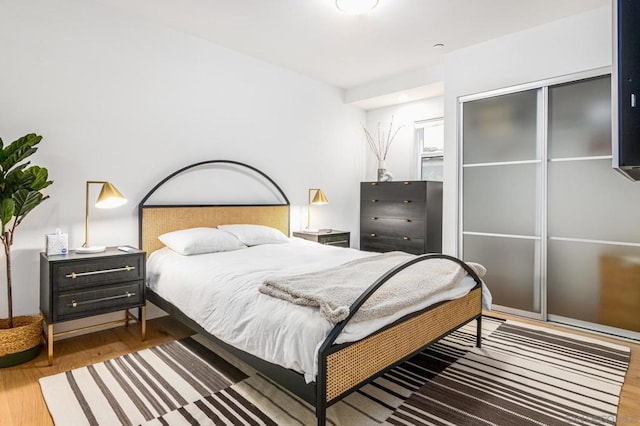 bedroom featuring hardwood / wood-style flooring