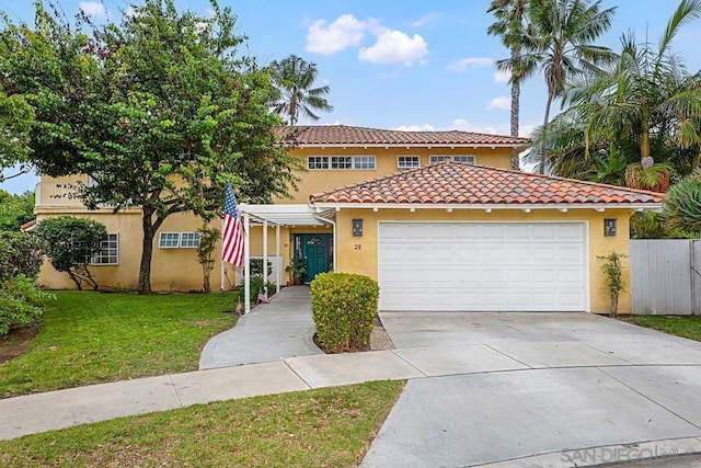 mediterranean / spanish home featuring a garage and a front lawn