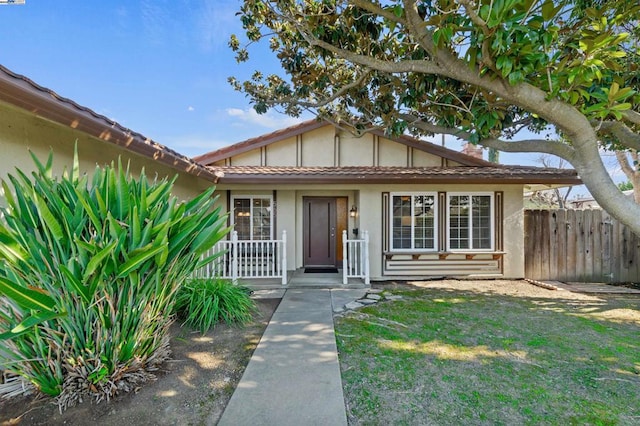 view of front of home with a front lawn